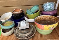 Wide view of all vases, planters, and drip saucers stacked
