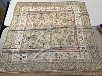 Cream and green floral scarf with printed cross-stitch pattern and Past Times tag