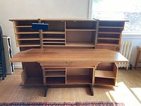 Desk open showing drop-down writing surface and interior shelving