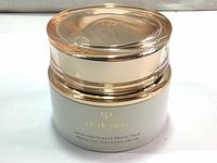 Front view of Cle De Peau Beaute Protective Fortifying Cream jar showing product name and packaging.