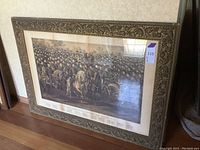 Framed full view of the large Civil War major generals print leaning against a wall.