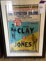 Framed boxing poster featuring Cassius Clay vs Doug Jones