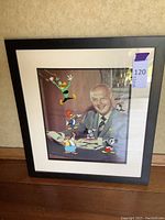 Front view of framed cell art displaying Walter Lantz photograph with overlaid character cels