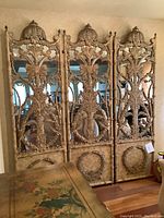 Overall view of entire three-panel room divider in situ