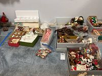 Overview of all boxes and loose items on carpet