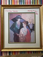 Full view of framed print with signature, original price noted on matting, and gold decorative frame.