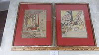 Two bamboo-style framed Japanese art prints placed side by side showing full frames and matting.
