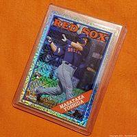 Front of Masataka Yoshida 2023 Topps Silver Pack Mojo rookie card with Red Sox uniform and holographic pattern