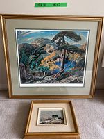 Framed 16x20 print and smaller framed 5x7 painting displayed on carpet.