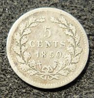 Obverse side of the coin showing denomination '5 CENTS 1850' surrounded by oak leaves and bow.