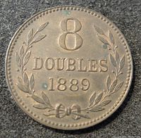 Close-up of obverse side showing '8 DOUBLES 1889' with laurel wreath and minor patina spots.