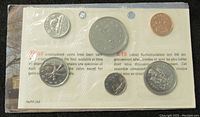 Front view of 6 Canadian coins sealed in original uncirculated packaging from 1977.