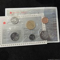 Front view of 1995 Canada 6 Coin Uncirculated Set in sealed plastic pouch with informational insert.