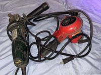 Overview of both tools together showing cords and handles