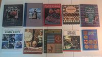Lot of 10 knitting books arranged flat showing front covers.
