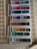 Top view showing colorful Spools of Sulky thread inside plastic Slimline Storage Box