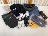 Overview of all golf accessories including club covers, gloves, swing weight, bags and sunglasses