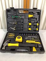 Full view of Stanley tool kit in carrying case showing all tools organized in fitted slots.