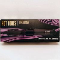 Box containing new Hot Tools Professional 1-inch Hot Air Brush, showing branding and product image on packaging.