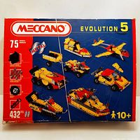 Box top displaying Meccano Evolution 5 branding, model count (75), piece count (432), and examples of built models such as helicopter, airplane, truck, boat, and vehicle.
