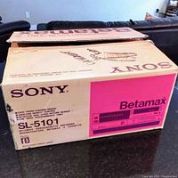 Original beige and pink Sony Betamax SL-5101 box with printed text and graphics showing model number and features.