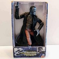 Front view of Nightcrawler 12 inch figure in original window display box showing figure pose, colors, and condition of packaging.