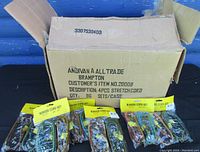 Box labeled for 96 sets per case with some of the bungee cord sets placed in front showing packaging and contents