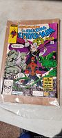 Front cover of the comic book showing The Amazing Spider-Man title and colorful artwork of Spider-Man battling Scorpion.