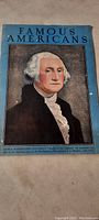 Front cover of the 1939 large publication titled 'Famous Americans' featuring a full-color portrait of George Washington.