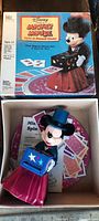 Box of vintage 1980s Disney Mickey Mouse TopHat Magic Game including the figurine, game board, and instructions.