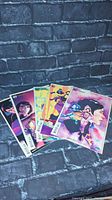 Five DC Wonder Twins variant cover comic books fanned out, showing colorful dynamic character art.