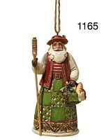 Front view of the Enesco Jim Shore Heartwood Creek Italian Santa ornament hanging by a looped string. Santa is holding a staff and a basket with bread.