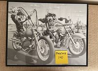 Full view of the framed black and white poster featuring Bugs Bunny and Tasmanian Devil riding motorcycles in a desert background.