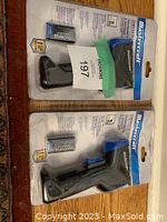 Two packaged Mastercraft digital thermometers including batteries, shown upright on a flat surface.