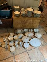 Full display of plates, bowls, cups and serving pieces on floor
