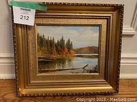 Original landscape painting in ornate gold frame, signed by artist M.F.K., size 15x13 inches with frame