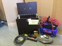 Full lot with compressor, nailer, extension cord, staples, and storage box