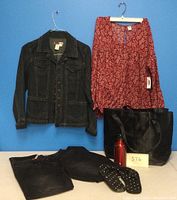 Photo showing dark denim jean jacket, red floral blouse, dark blue jeans, black tote, and black flip flops with polka dots arranged together