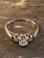 Top-down view showing central round diamond and band design
