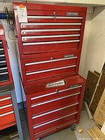 Full frontal view of stacked red Craftsman tool chest showing all three modules