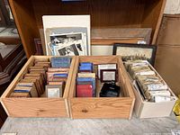Wooden trays and box with numerous cardboard boxes of dry plates and envelopes of prints