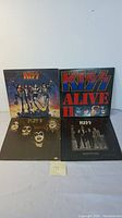 Four Kiss vinyl LP album covers arranged to display titles and artwork.