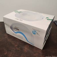 Boxed ALH80 Pro laser hair regrowth device showing product image and treatment time of 20 minutes twice per week.