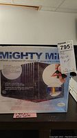 Photo of Mighty Mini air brush and compressor kit in original box showing front package graphics and product label.