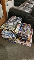 Overview of stacked building sets including multiple Mega Construx Halo boxes and other kits