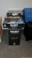 Stack of four sealed Mega Bloks Call of Duty construction set boxes