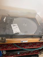 Front view of turntable with clear acrylic dust cover closed