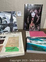 Lot of five books on arts and miscellaneous topics, including one with water damage marked on cover