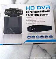 Photo of the product box front showing features and image of the HD Portable DVR dash cam with 2.5-inch TFT LCD screen