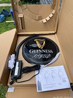 Sign, transformer, mounting bracket and instruction manual inside original shipping box